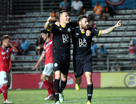 Pattaya United’s Nikola Komazec (left) and Milan Bubalo (right) of Serbia celebrate the latter’s goal during first half stoppage time of their Thai Division 1 fixture against Samut Songkhram FC at the Nongprue Stadium in Pattaya, Sunday, March 8.