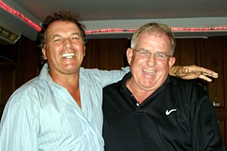 Barry Copestake (right) celebrates his hole in one with friend Thierry Bietry.
