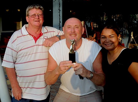 Kev Hamilton, winner of the DeVere monthly medal, flanked by Wayne and Sunanta Cotterell.