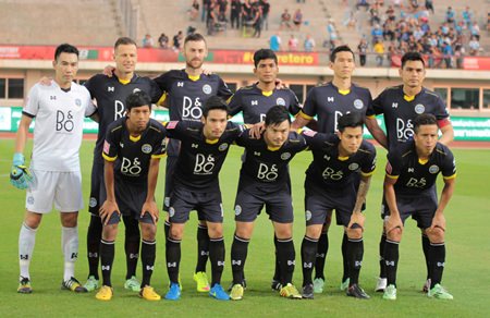 Pattaya United FC line up before their Thai League Division 1 fixture against Thai Honda FC at the 72nd Anniversary Stadium in Bangkok, Sunday, March 1.