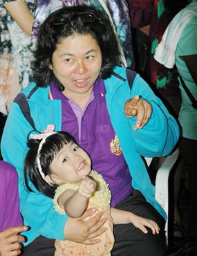 “Look Mae, a ghost!” Namon says to her mother.