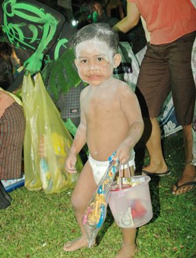 The ghost chief’s son gathers food and gifts, clad only in diapers.