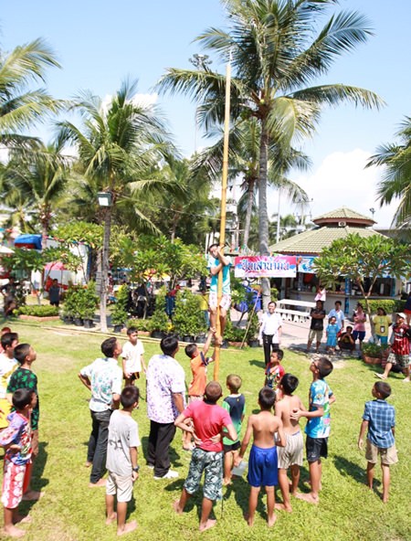There is money at the top of the greased pole - anyone that can grab it, wins it. 