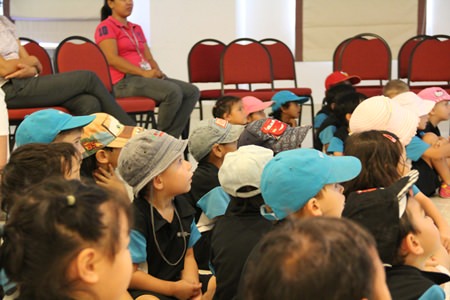 Students listen intently to author ‘Kamon’.