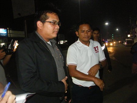 Pol. Sen. Sgt. Maj. Somyot Jumpahom (white shirt with #27) has been accused of running a red light whilst striking and killing a motorcyclist.