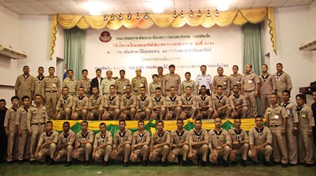 Officers, teachers and many students pose for a group photo after the launch of the program.