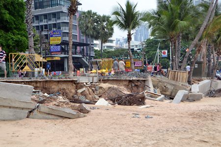 Barriers were broken down and nearly washed away from Pattaya Beach at the end of Soi 1 during the storm.