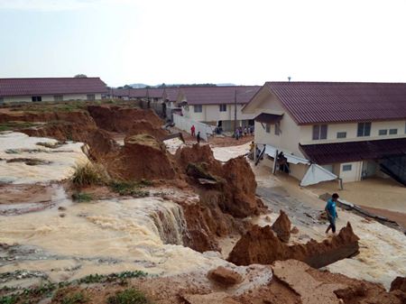 Poorly designed and constructed flood prevention measures in this housing development gave way, creating a landslide and a dangerous situation for residents.