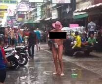 Apparently this European woman didn’t get the memo from the “culture police” about no lewd behavior during Songkran, when she walked around Soi 6 more than half naked.