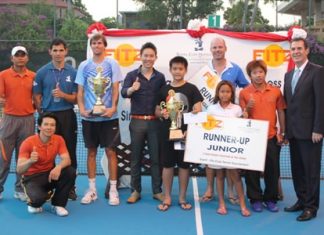 Vitanart Vathanakul, Executive Director of the Royal Cliff Hotels Group (5th from left), Antonello Passa, General Manager of the Royal Cliff Hotels Group (right) and Kritsana Sorahong, the Fitz Club –Racquets, Health & Fitness Manager (left kneeling) congratulate all the winners and finalists of the 5th Fitz Club Tennis Tournament on April 6.