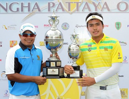 Prayad Marksaeng (left) and 16-year old amateur golfer Suradit Yongcharoenchai (right) pose with their trophies at the conclusion of the 2015 Singha Pattaya Open at Burapha Golf Club, Sunday, March 29.