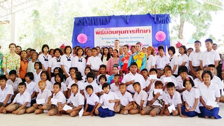 Dr. Ramin Yachkaschi (back row middle) with ‘his children’, parents, and teachers.