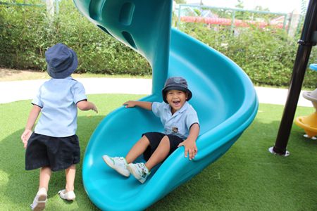 This slide is amazing! A GIS student enjoys the new ride.