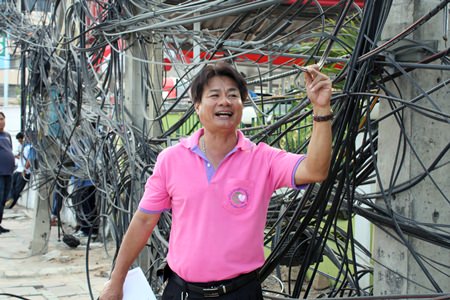PEA technical officer Panya Boonsamer says that shoddy work by technicians from cable-television and Internet suppliers is to blame for the tangled mess of wires seen around town.