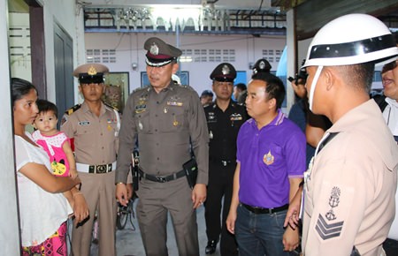 Sattahip police and administrative officials meet with migrant laborers to ease wariness of authorities and investigate possible cases of human trafficking.