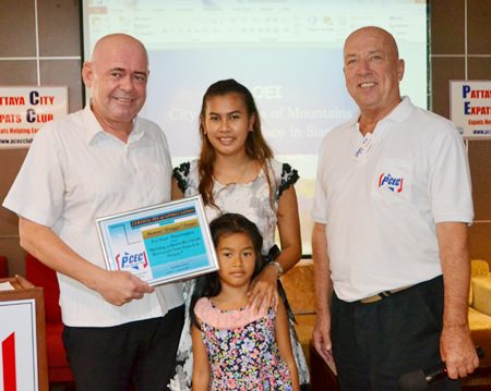 Stewart is joined by his family as Roy Albiston presents him with the PCEC’s Certificate of Appreciation for his interesting presentation to the Club.
