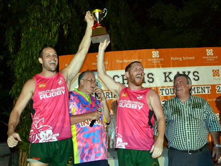 Representatives of Southerners Gold hoist the Cup after winning the 2015 Chris Kays Memorial Rugby Tournament.