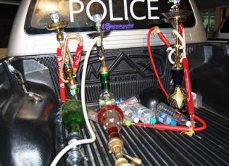 Police confiscated hooka water pipes from a store in South Pattaya.