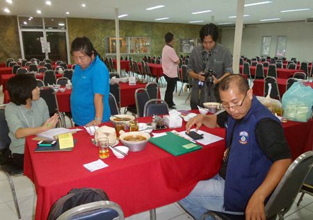 Officers from the Chonburi Public Health Department and local police raid Suvarnabhumi Thai Massage for allegedly selling substandard food and drugs.