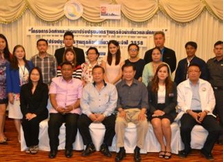 Tour guides and tourism-industry business owners assembled for a group photo after learning how to raise their service standards at a seminar in Pattaya.
