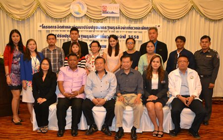 Tour guides and tourism-industry business owners assembled for a group photo after learning how to raise their service standards at a seminar in Pattaya.