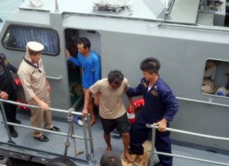 The Royal Thai Navy brings ashore fishermen who floated in the sea for 18 hours after their boat sank.