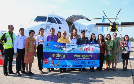 Management and guests celebrate commuter airline Kan Air’s launch of four new domestic routes.