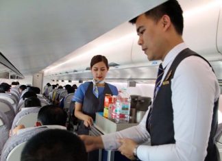 Kan Air staff serve the airline’s first passengers on its new route from U-Tapao.