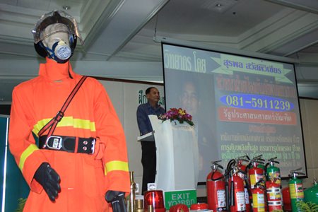 Pattaya’s Disaster Prevention and Mitigation Office Chief Surapol Sawadvichien teaches basic fire safety at the Royal Cliff.