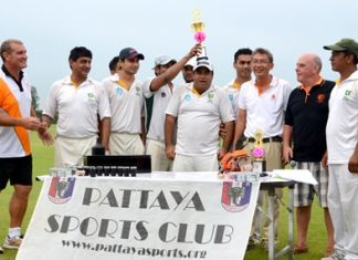 The Pakistan Sports Club team hoist the Super 8’s trophy as they are joined by Pattaya Cricket Club Captain Simon Philbrook (far left), Tournament Director Joe Grunwell (2nd right) and Thai Polo Club MD, Kh. Surapol (3rd right).