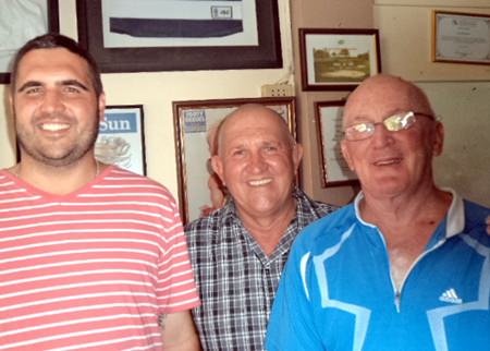 (Left to right) Peter McDonald, Deefa the Dog and Sal Brizzi, with Rocky Lawson taking a sneak peek.