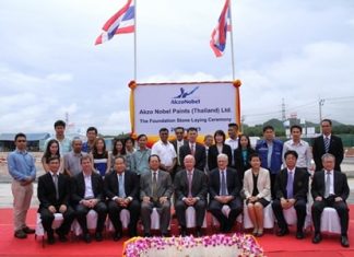 Shown in photo: David Nardone (4th right, seated), President & CEO, Vivat Jiratikarnsakul (far right, seated), Executive Vice President & COO, and Siyaphas Chantachairoj (5th right, standing), Director - Corporate Marketing & Property Customer Development, Hemaraj Land And Development Plc. with AkzoNobel executives, Neil Galloway (centre, seated), Engineering Director Performance Coatings, and Jeff James (2nd left, seated), Business Director Protective Coatings, South Asia, during the foundation stone laying ceremony.