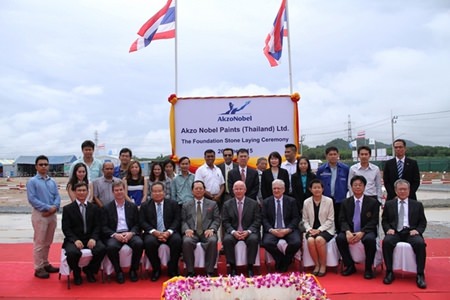 Shown in photo: David Nardone (4th right, seated), President & CEO, Vivat Jiratikarnsakul (far right, seated), Executive Vice President & COO, and Siyaphas Chantachairoj (5th right, standing), Director - Corporate Marketing & Property Customer Development, Hemaraj Land And Development Plc. with AkzoNobel executives, Neil Galloway (centre, seated), Engineering Director Performance Coatings, and Jeff James (2nd left, seated), Business Director Protective Coatings, South Asia, during the foundation stone laying ceremony.