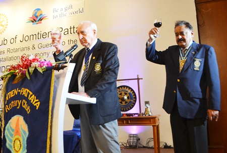 PAG Dennis Stark and PDG Peter Malhotra raise their glasses to Rotary International.