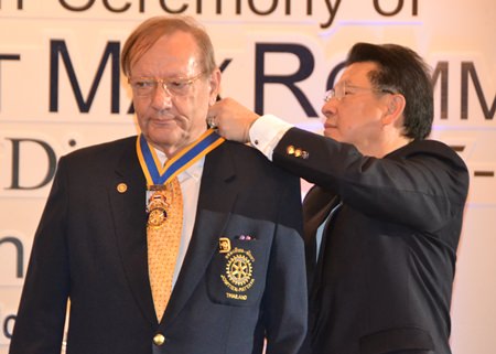 Max Rommel seems pensive as DGE Vivat installs him as president with the insignia of his high office.