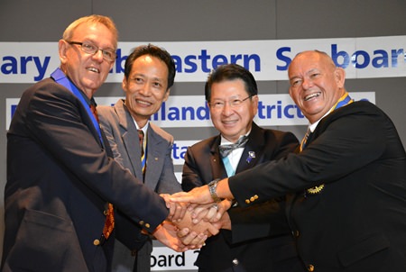 Rotarians united in the act of service; Russell Iffland, Vutikorn Kamolchote, DGE Vivat Pipatchaisiri and Rodney Charman.