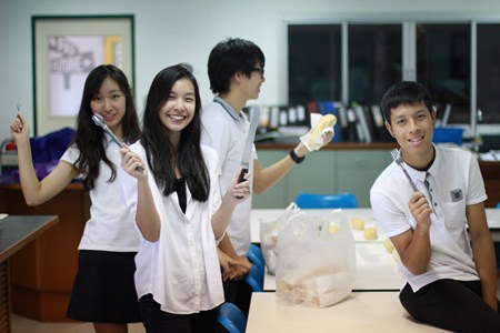 GIS Prefects helped prepare the hot dogs.