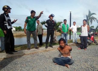 Neighbors restrained Rungroj Boongerd until police arrived, after he had tried to rape and rob a woman in Naklua.