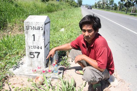 Hopeful lottery players believe the empty soda bottles are proof the spirits are alive and thirsty.