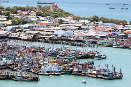Dozens of boats sit idle in Sattahip, showing solidarity to hundreds of others across the Eastern Seaboard who either didn’t or couldn’t meet the June 30 deadline to comply with so-called “illegal, unreported and unregistered” fishing rules to prevent Thailand’s seafood exports from being banned in Europe. 