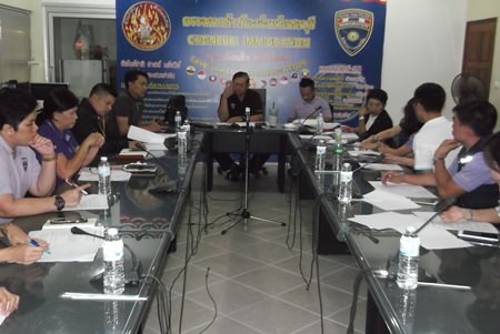 Pol. Col. Jedsada Yaisun, deputy commander of Immigration Division 3, talks to officers about increasing the efficiency of their services.