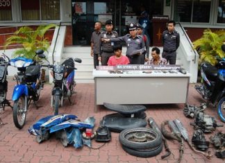 Motorcycle thief Saharat Polraj (left) and gun maker Paisan Daungsopa (right) were arrested and had their cache of gun and motorcycle parts confiscated.