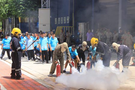 Fire fighters instructed students how to use fire extinguishers.