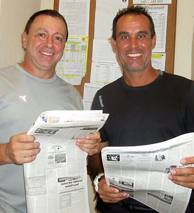 Tom Herrington (left) and Franck Martineau read about their great golf in Pattaya Mail.