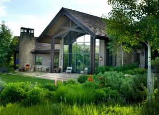 This undated photo shows the exterior of 35-acre Elk Ridge Ranch, a luxury home in Edwards, Colorado. (Ric Stovall/stovallstudio.com via AP)