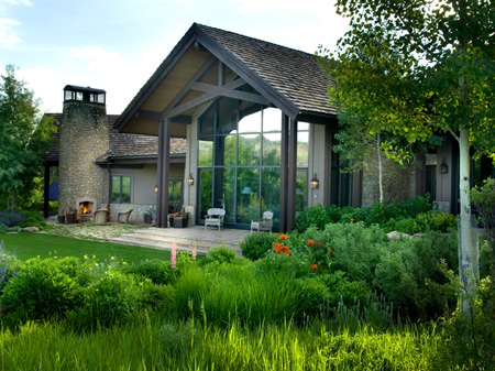 This undated photo shows the exterior of 35-acre Elk Ridge Ranch, a luxury home in Edwards, Colorado. (Ric Stovall/stovallstudio.com via AP)