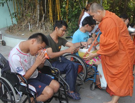 An early start to present food to the monks.