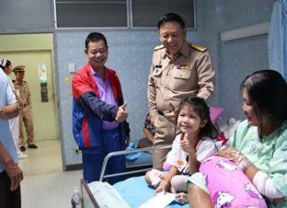 Young Miss Patidtha, after having one of her legs amputated as a result of a horrific crash, puts on a brave face, giving thumbs up to the visiting entourage.