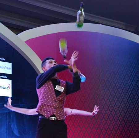 Bartender Theerachai Khemwichai shows off his juggling prowess.