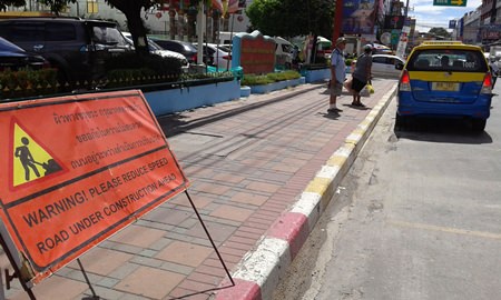The condition of the road in front of Friendship Supermarket is worsening.